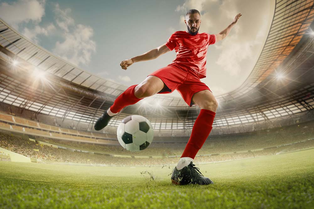 Fussballstadion mit Spieler in München Allianz Arena